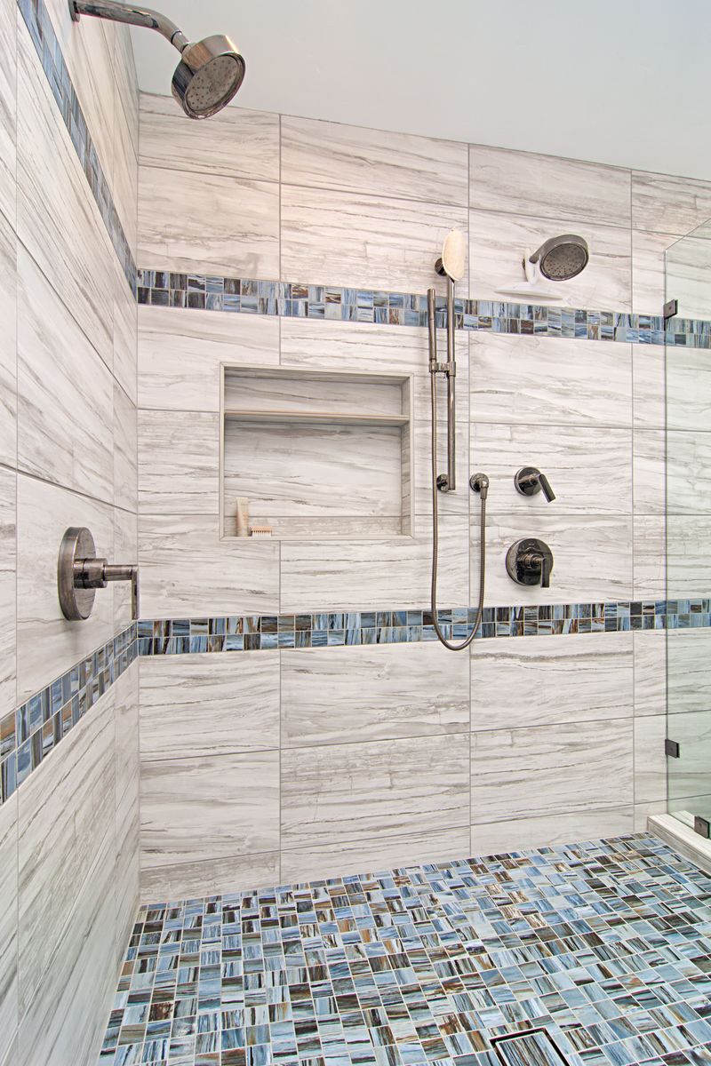 Raelene with tile and finish samples at a client's home