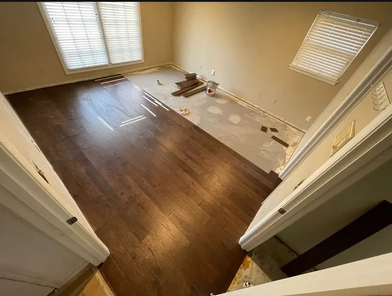 Room with newly installed hickory hardwood flooring