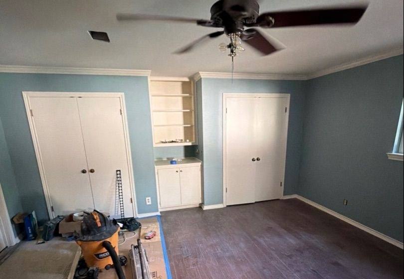Before and after photo of a master bedroom repainted by Hill Country Painting in Round Rock, TX