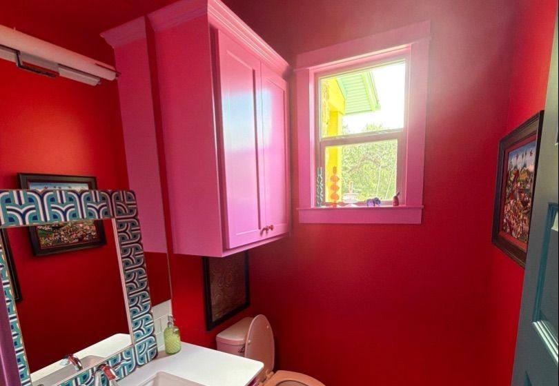 Before and after photo of a bathroom repainted by Hill Country Painting in Austin, TX