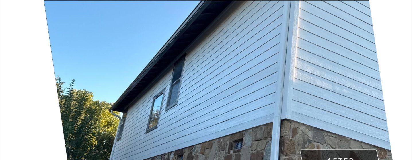 Before and after photo of a house exterior side painted by Hill Country Painting in Buda, TX