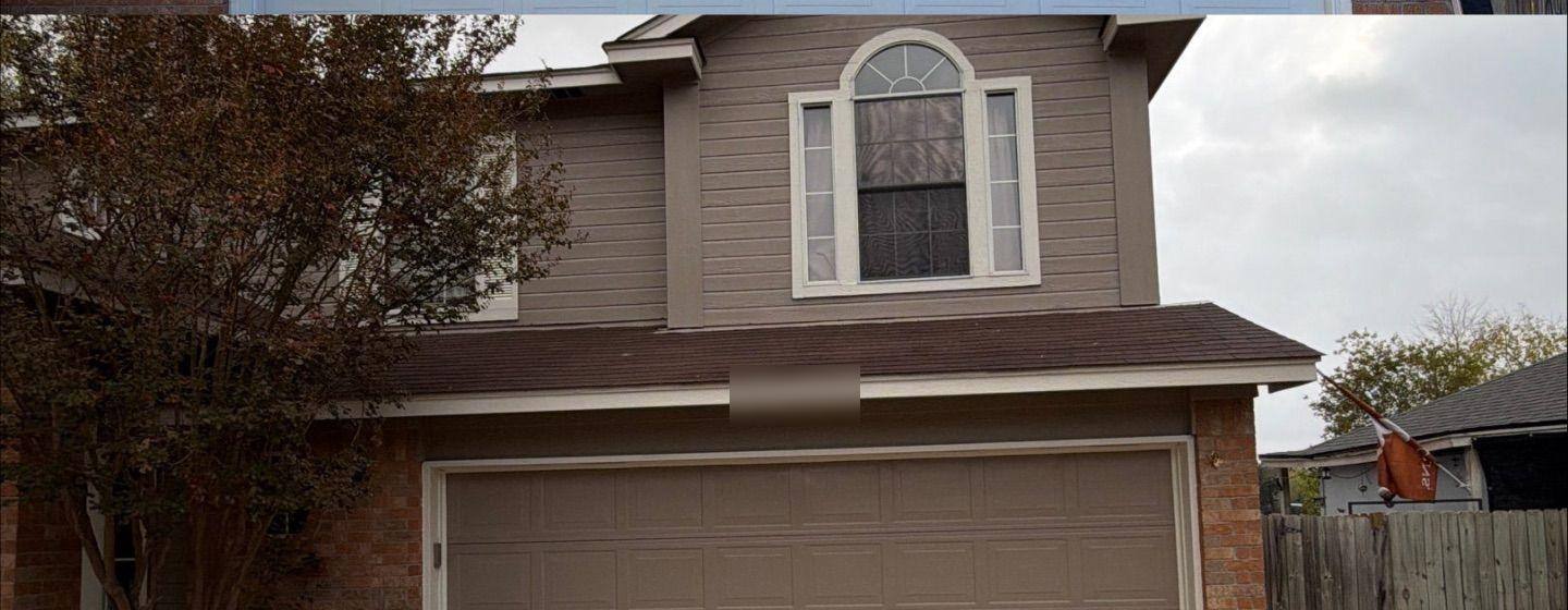 Before and after photo of a garage exterior painted by Hill Country Painting in Lockhart, TX