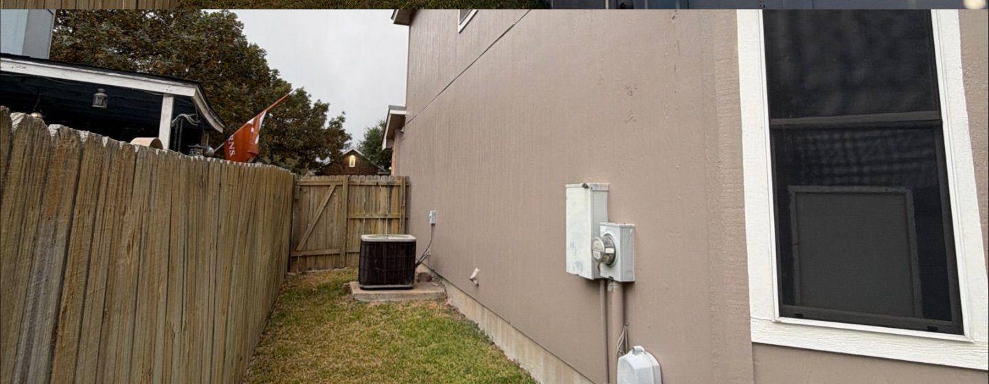 Before and after photo of exterior siding painted by Hill Country Painting in Lockhart, TX