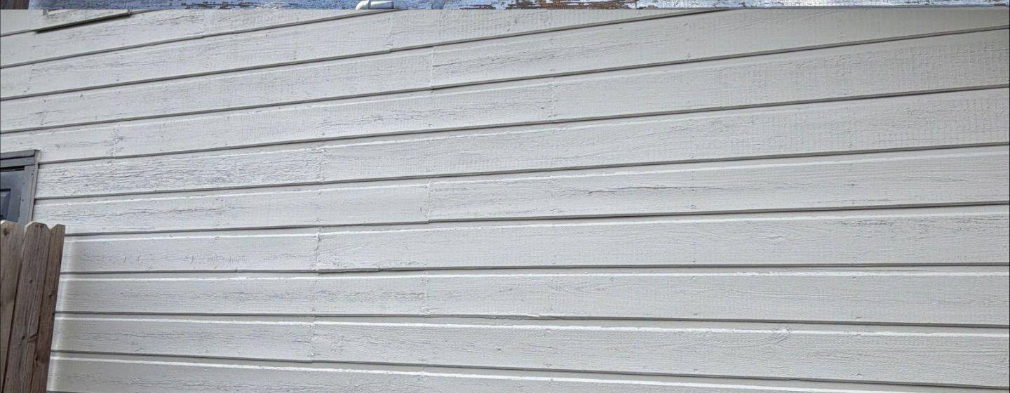 Before and after photo of exterior siding painted by Hill Country Painting in Austin, TX