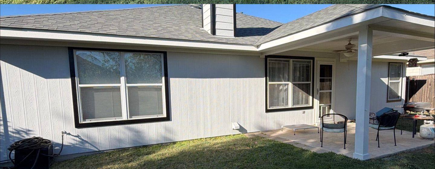 Before and after photo of a back patio and chimney painted by Hill Country Painting in Leander, TX