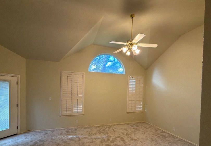 Before and after photo of a master bedroom painted by Hill Country Painting in Cedar Park, TX
