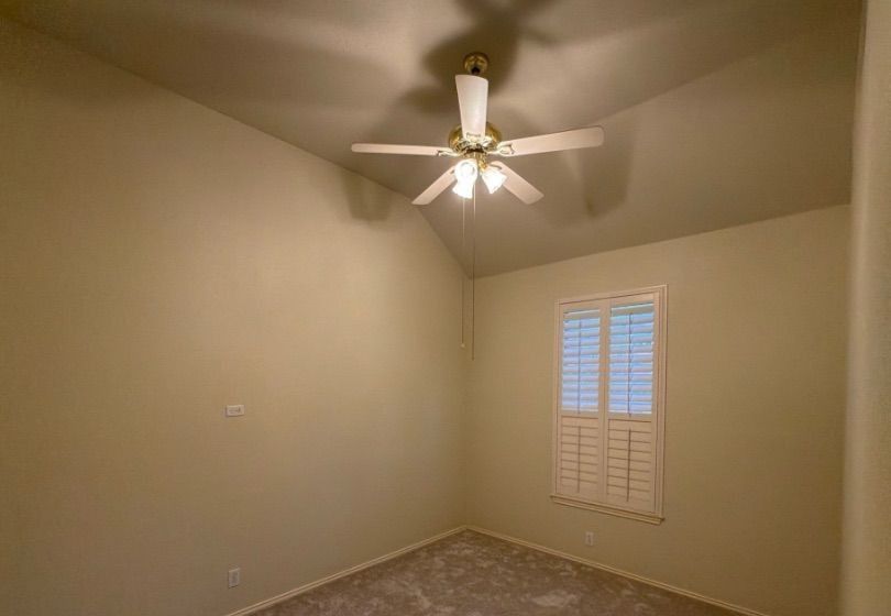 Before and after photo of a bedroom painted by Hill Country Painting in Cedar Park, TX