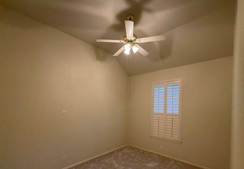 Before and after photo of a bedroom painted by Hill Country Painting in Cedar Park, TX