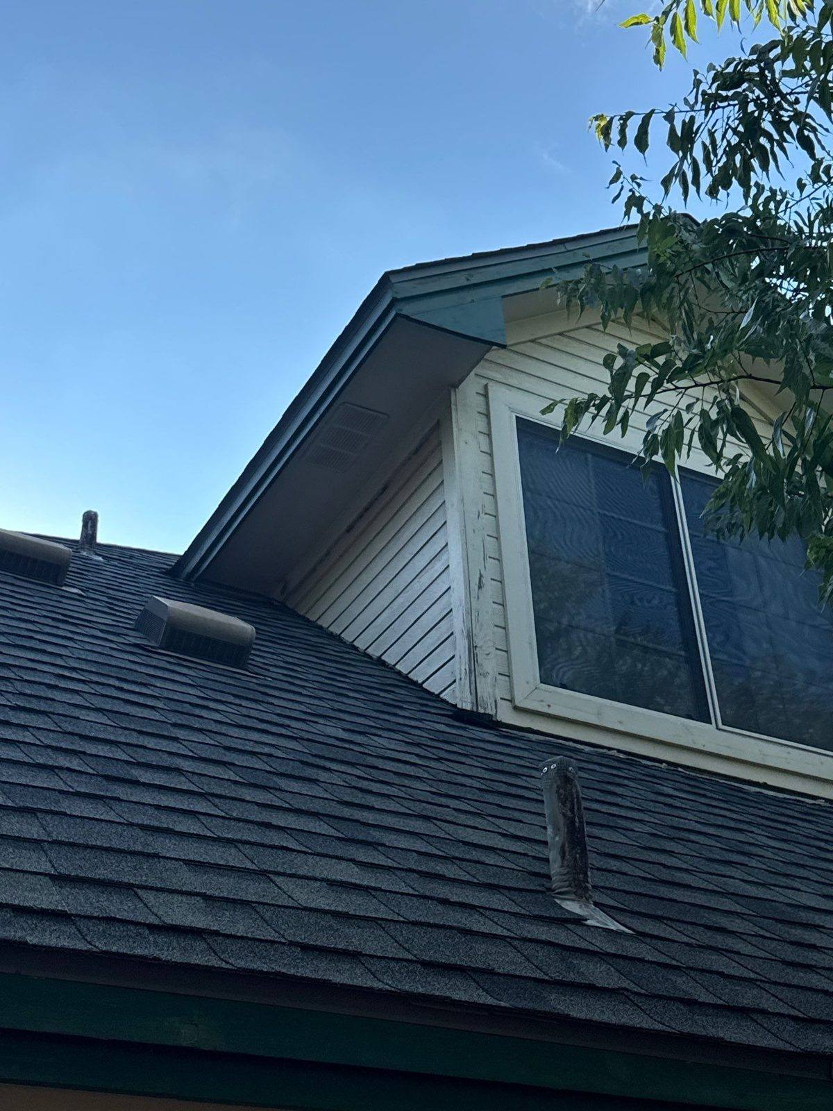 Carpentry crew replacing rotted corner trim on a home exterior in Austin, TX