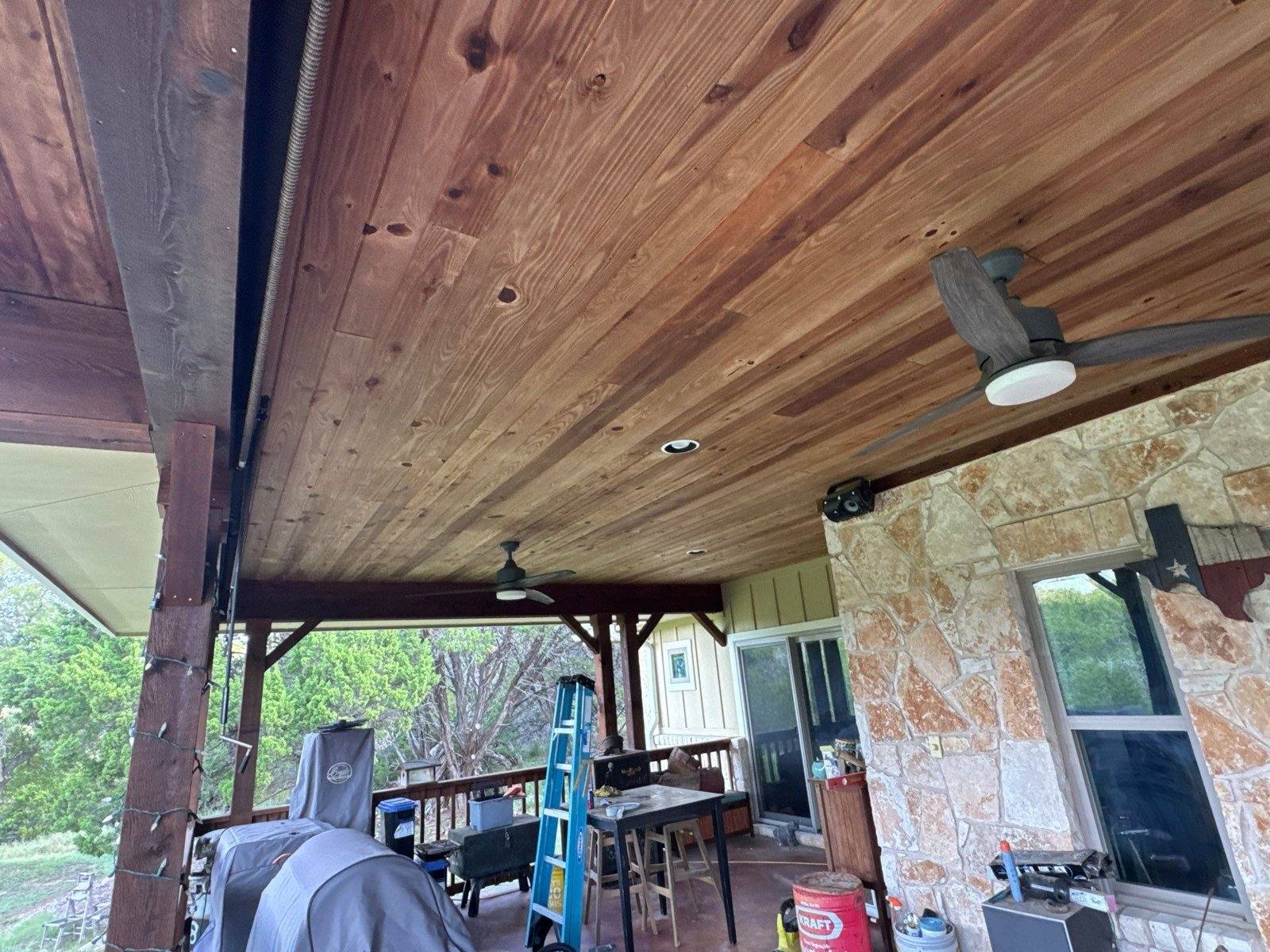 Wood back deck soffit ceiling ahead of a clear stain coat in Georgetown, TX by Hill Country Painting