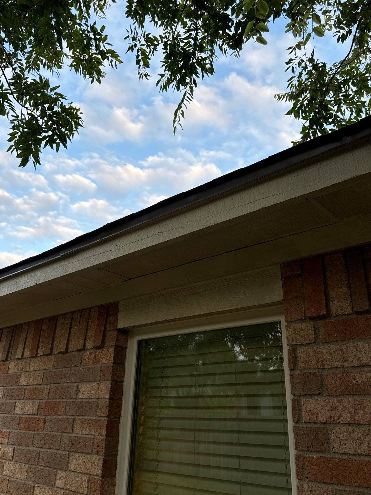 Cracked fascia board ahead of repair and repaint in Pflugerville, TX by Hill Country Painting