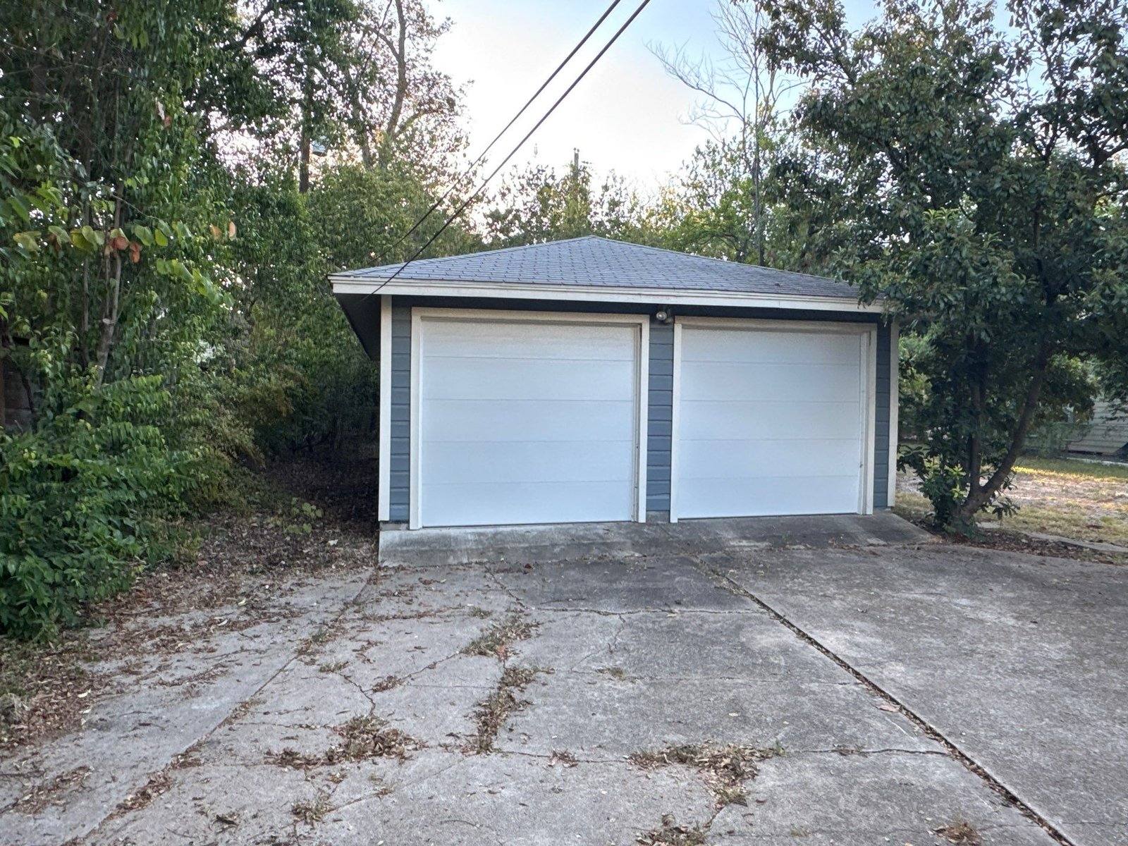 Detached garage with matching siding in Austin, TX by Hill Country Painting