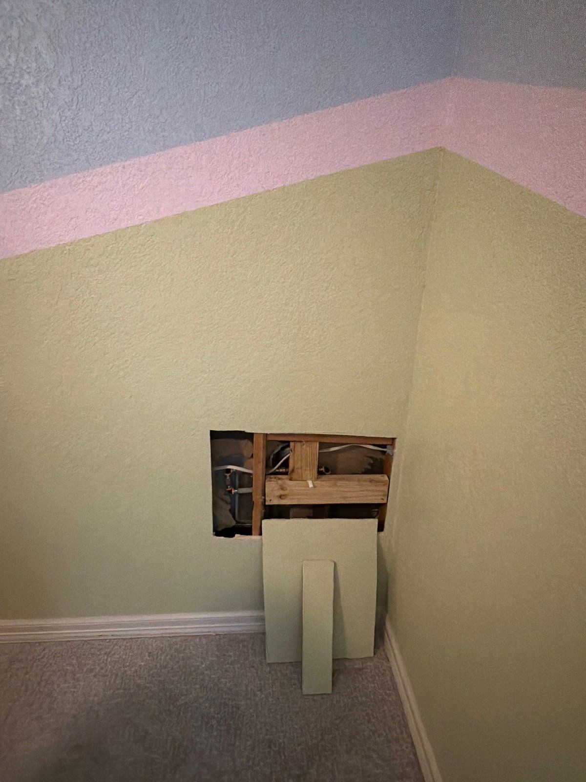 Bedroom wall before painting and drywall repair in Georgetown, TX by Hill Country Painting