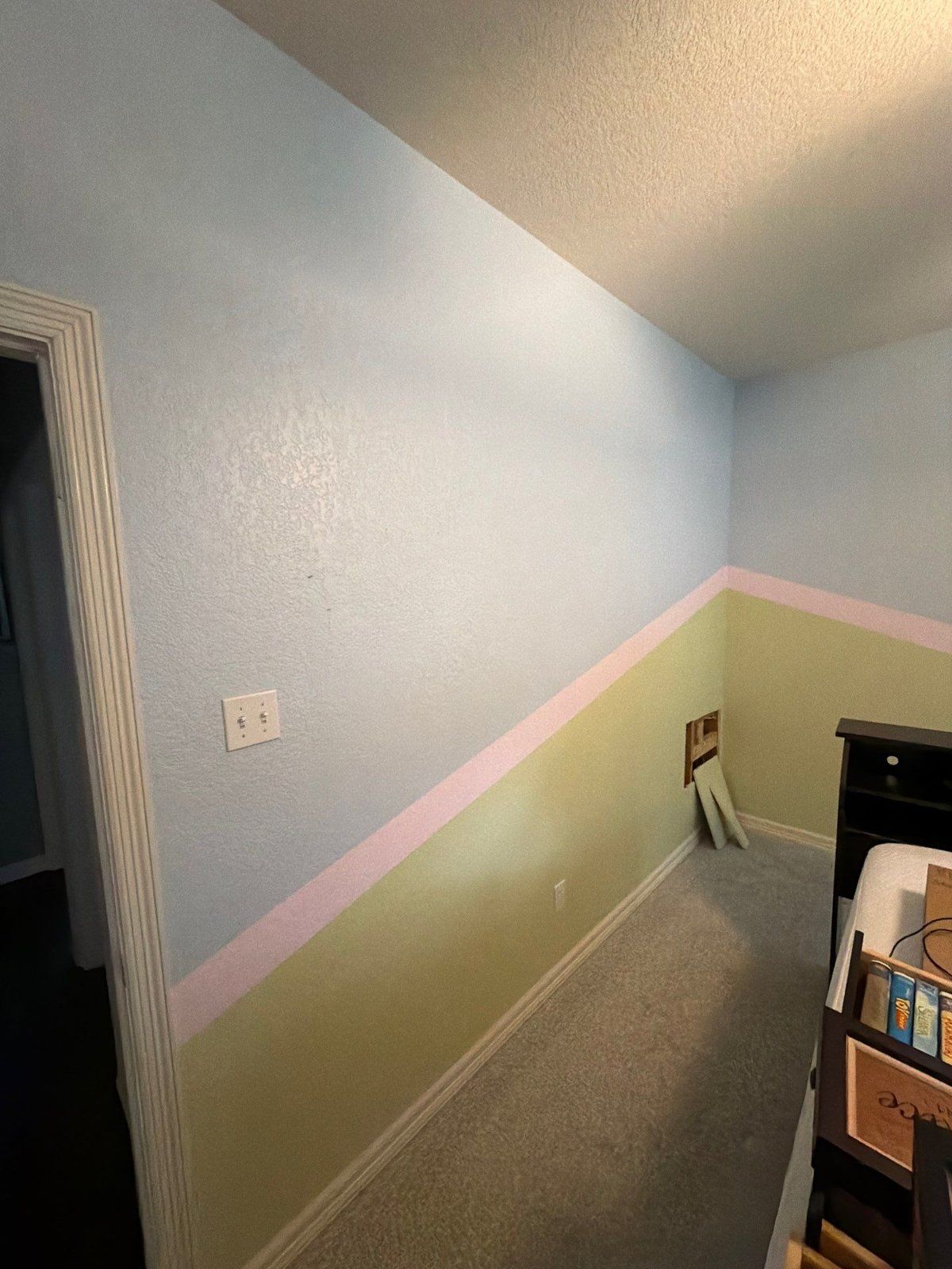 Bedroom corner before painting and drywall repair in Georgetown, TX by Hill Country Painting