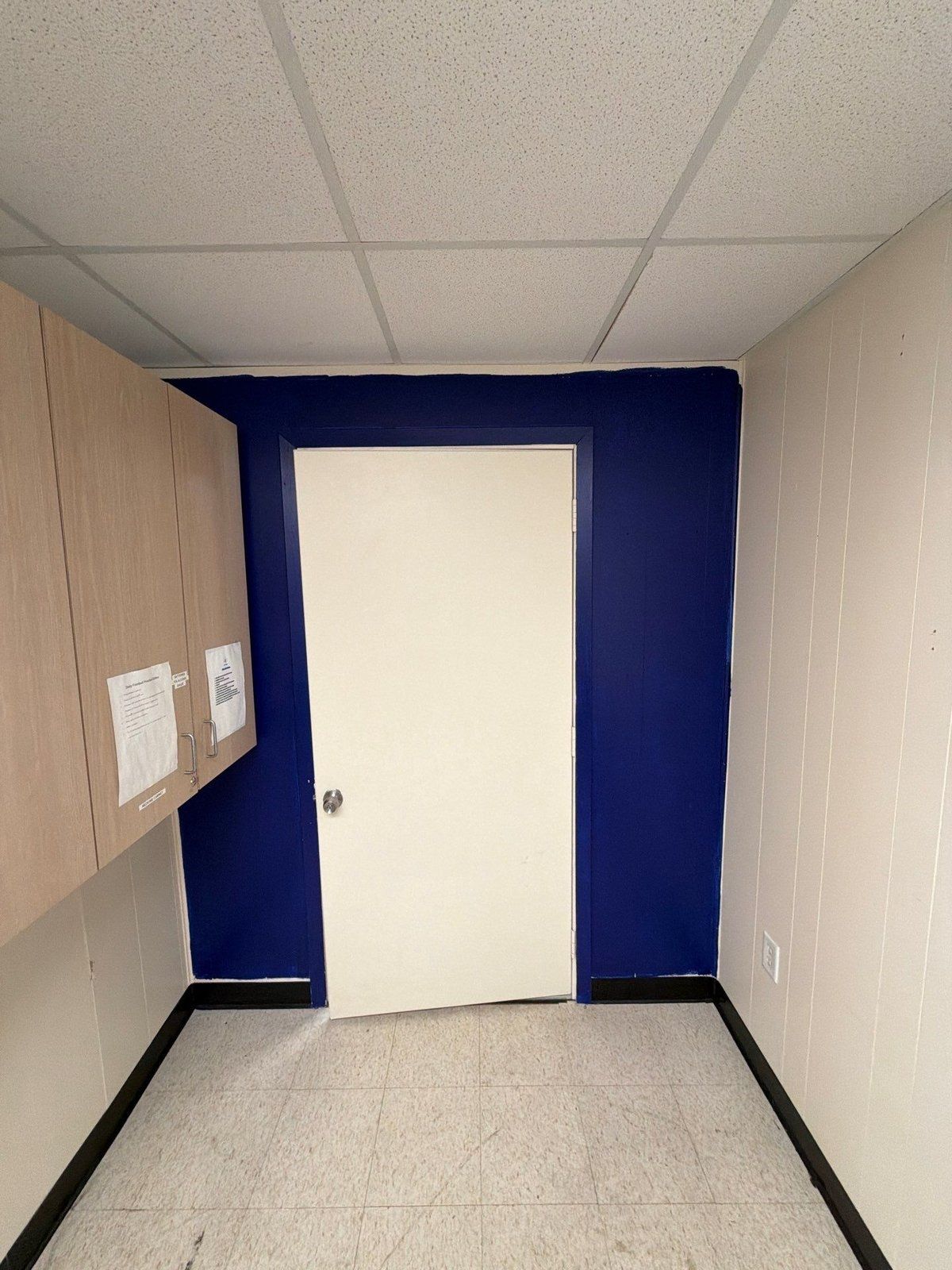 Portable classroom doorway before painting in Jarrell, TX by Hill Country Painting
