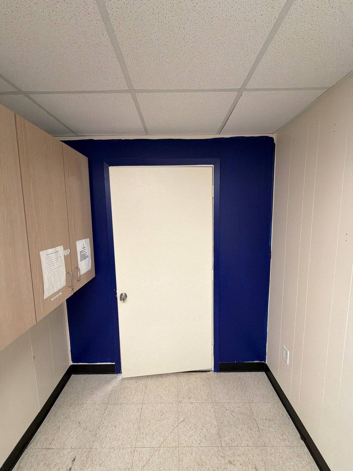 Portable classroom doorway before painting in Jarrell, TX by Hill Country Painting