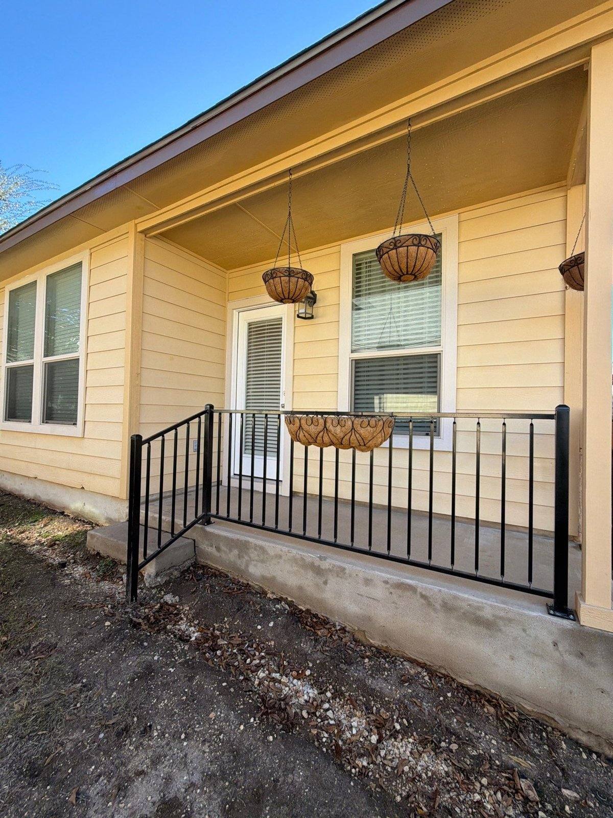 Front porch before exterior painting in Austin, TX by Hill Country Painting