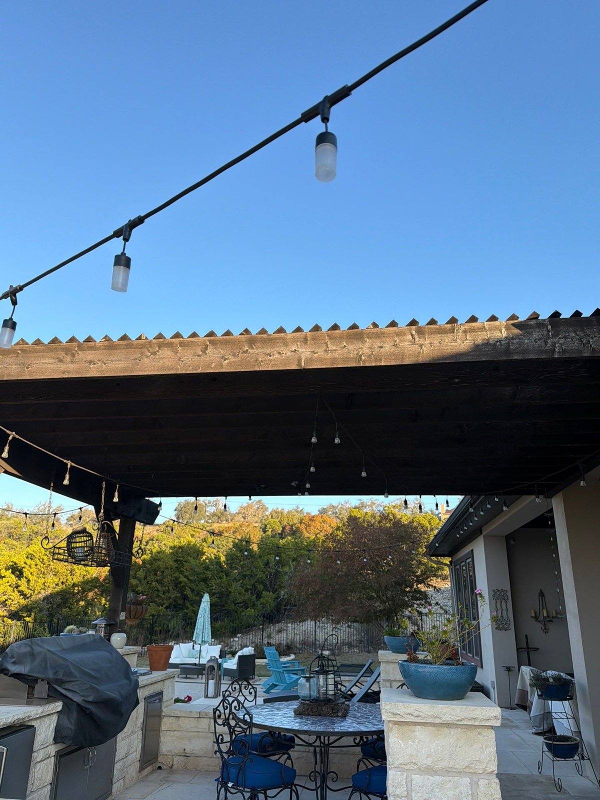 Patio pergola before restaining in Leander, TX by Hill Country Painting