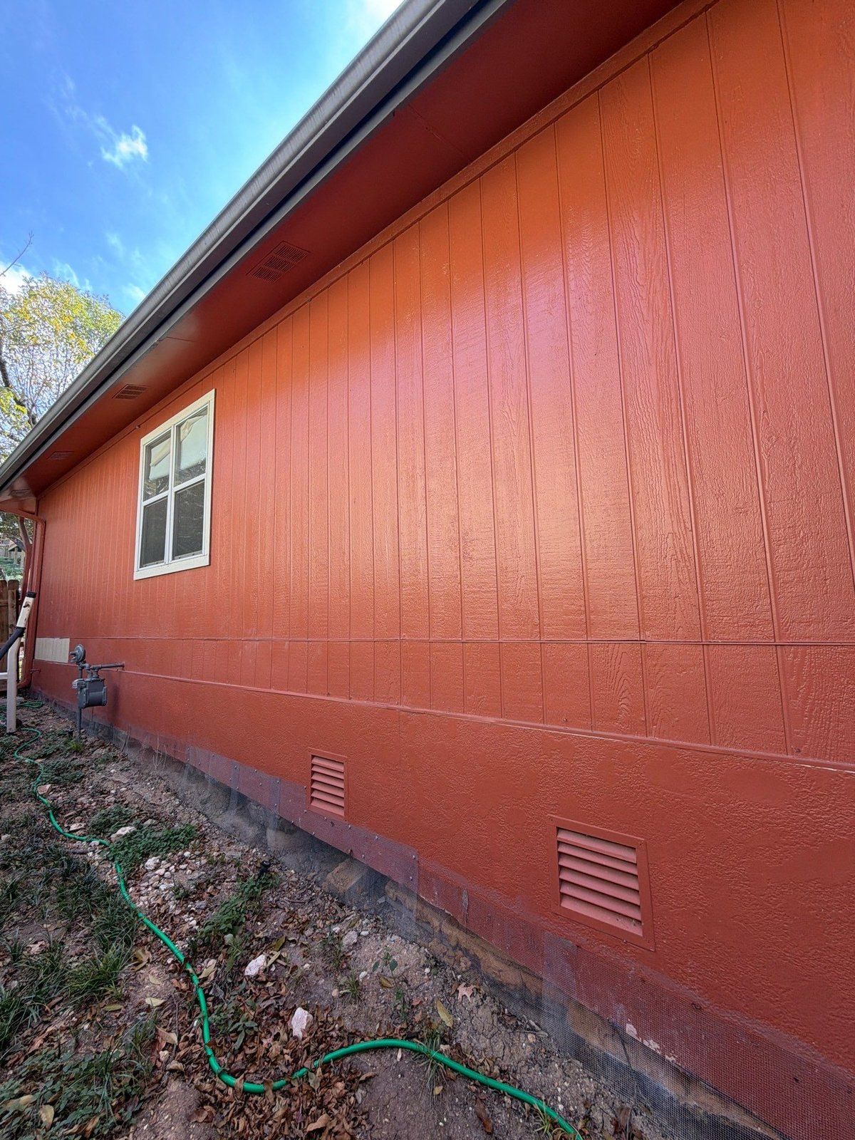 Exterior siding before painting in Austin, TX by Hill Country Painting