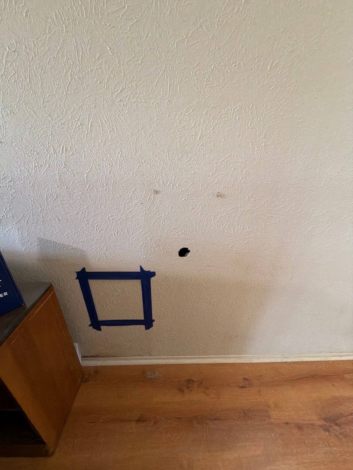 Interior wall repair prep before painting in Austin, TX by Hill Country Painting