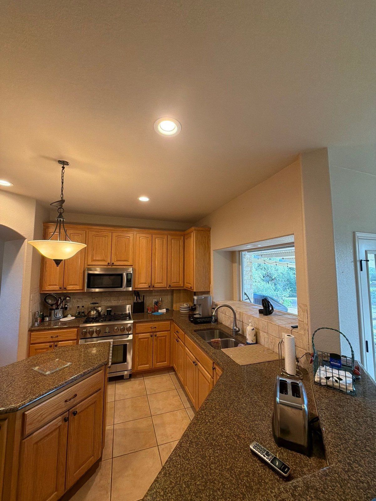Kitchen before painting in Georgetown, TX by Hill Country Painting
