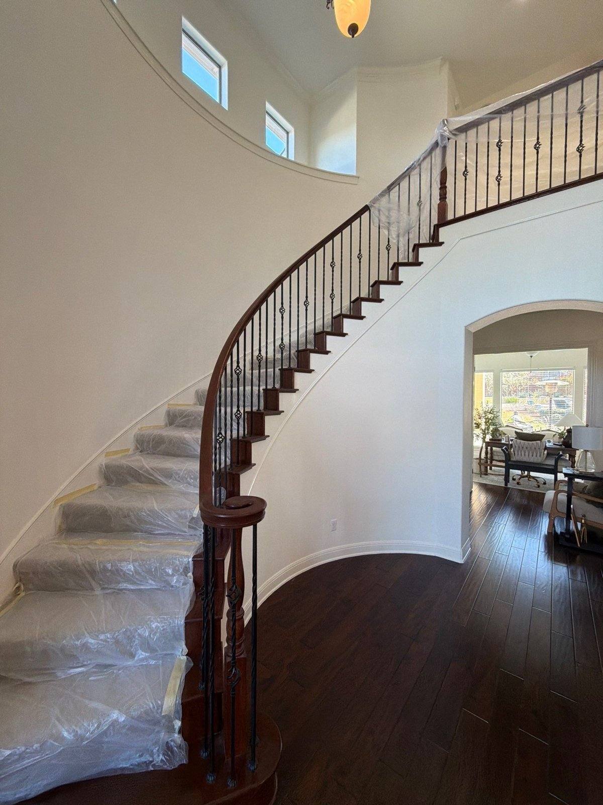 Staircase before painting in Leander, TX by Hill Country Painting