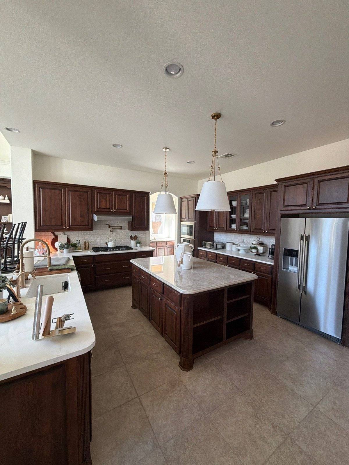 Kitchen before painting in Leander, TX by Hill Country Painting