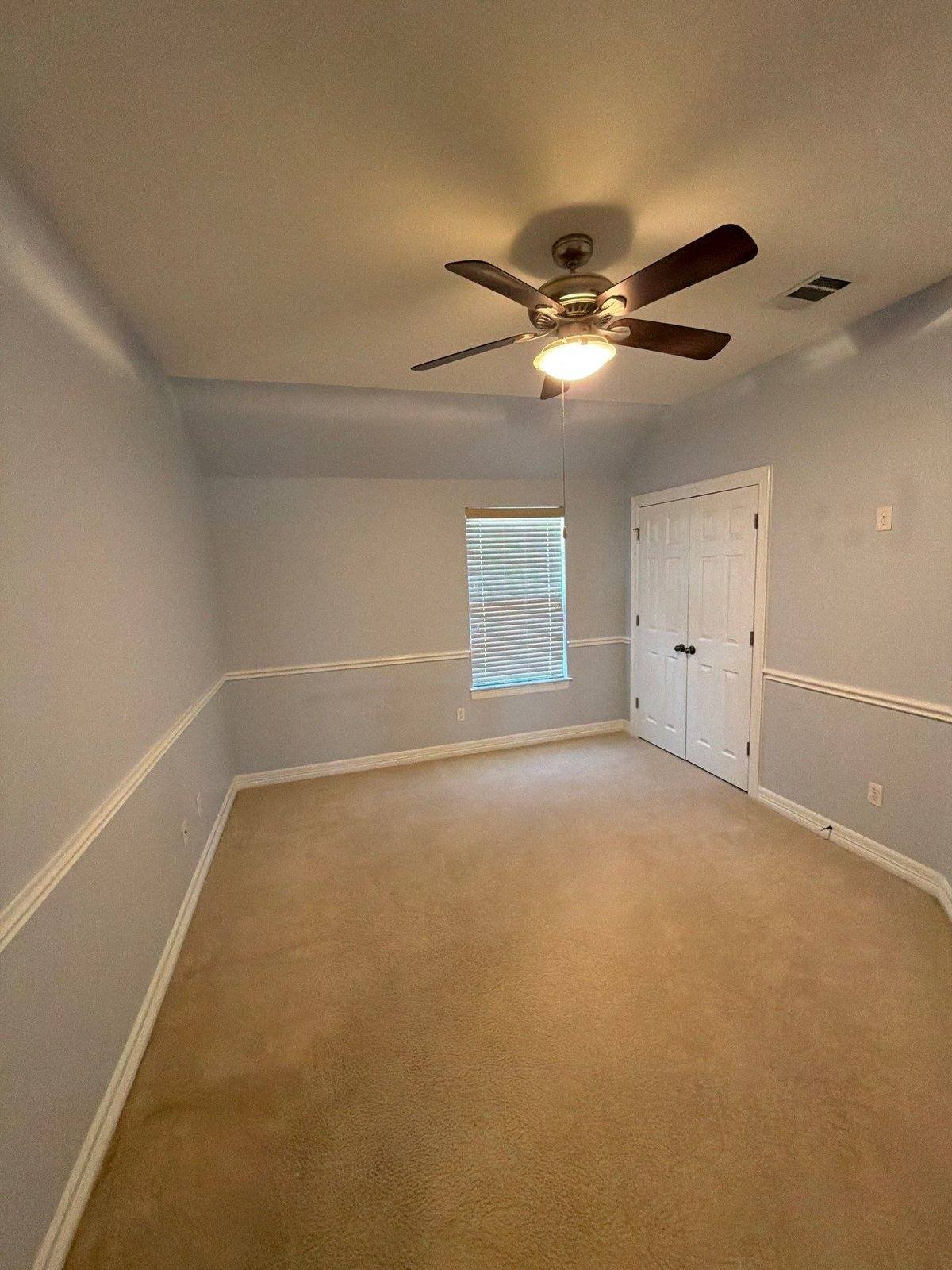 Bedroom before painting in Leander, TX by Hill Country Painting