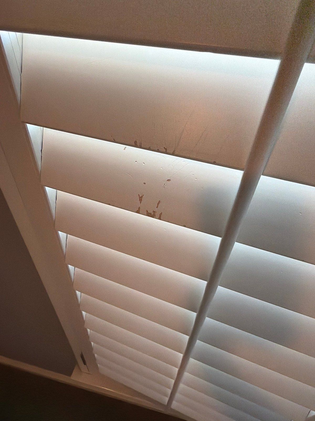 Bedroom plantation shutter before painting in Austin, TX by Hill Country Painting