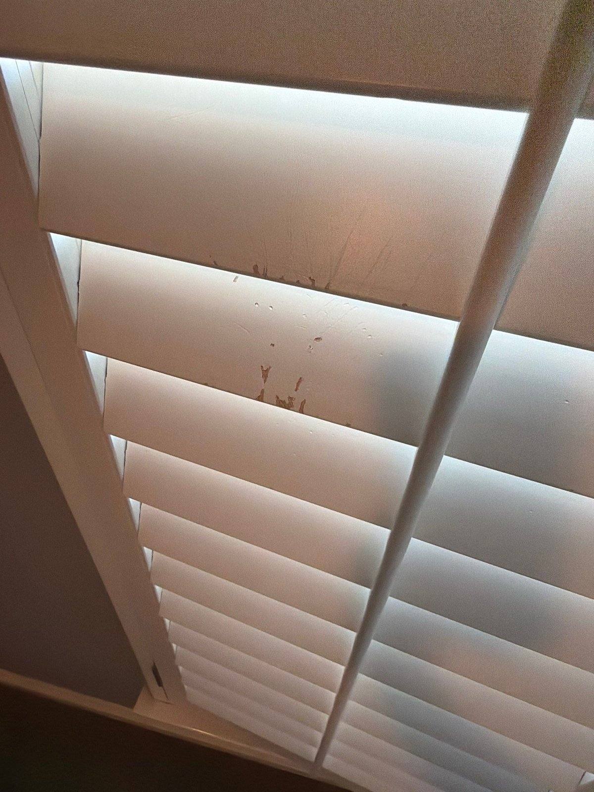 Bedroom plantation shutter before painting in Austin, TX by Hill Country Painting