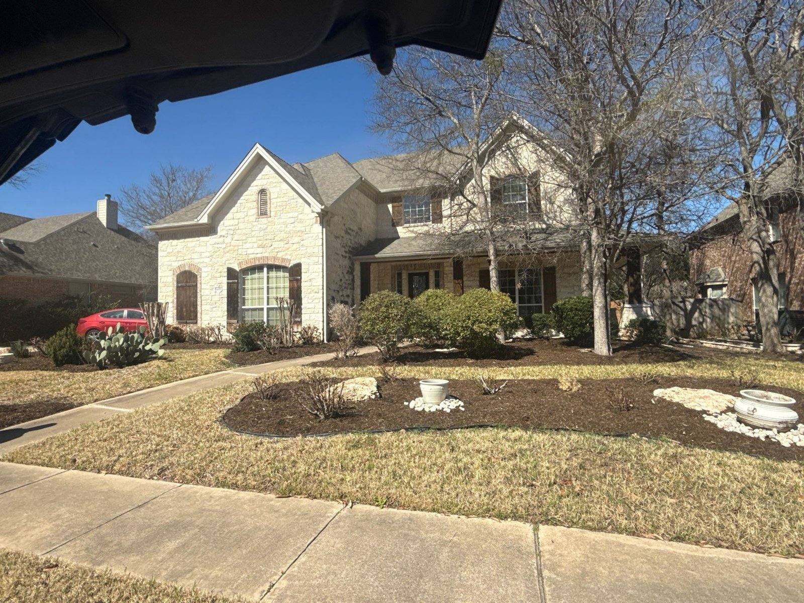 House exterior before painting in Round Rock, TX by Hill Country Painting
