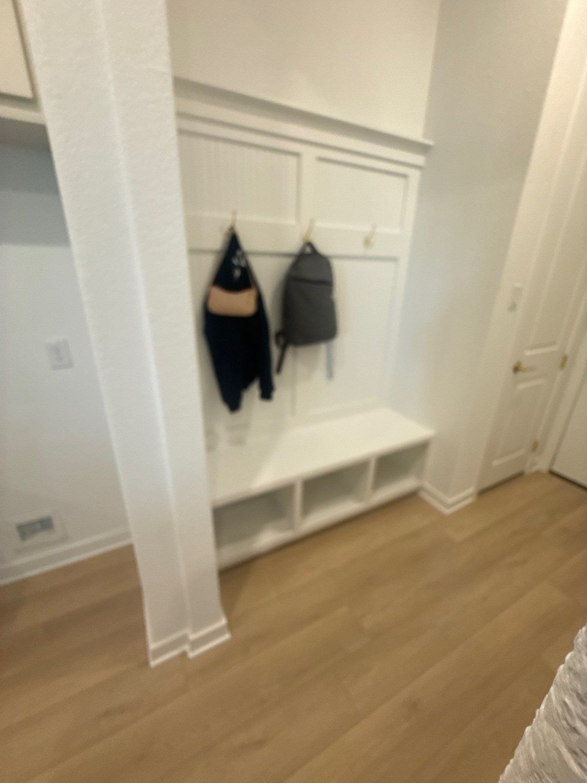 Mudroom cabinet before refinishing in Pflugerville, TX by Hill Country Painting