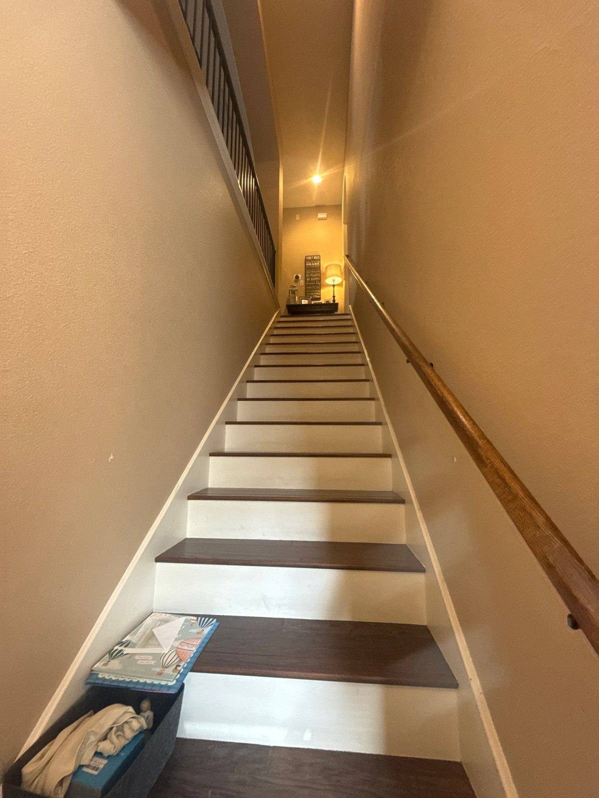 Stairwell before painting in Cedar Park, TX by Hill Country Painting