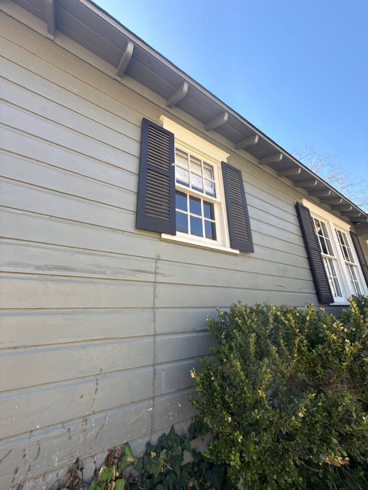 Front of house before exterior painting in Austin, TX by Hill Country Painting