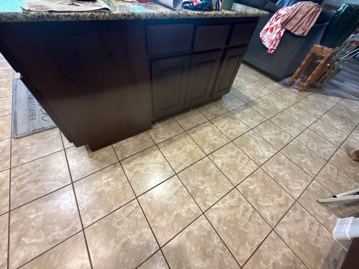 Kitchen island before cabinet painting in Cedar Park, TX by Hill Country Painting