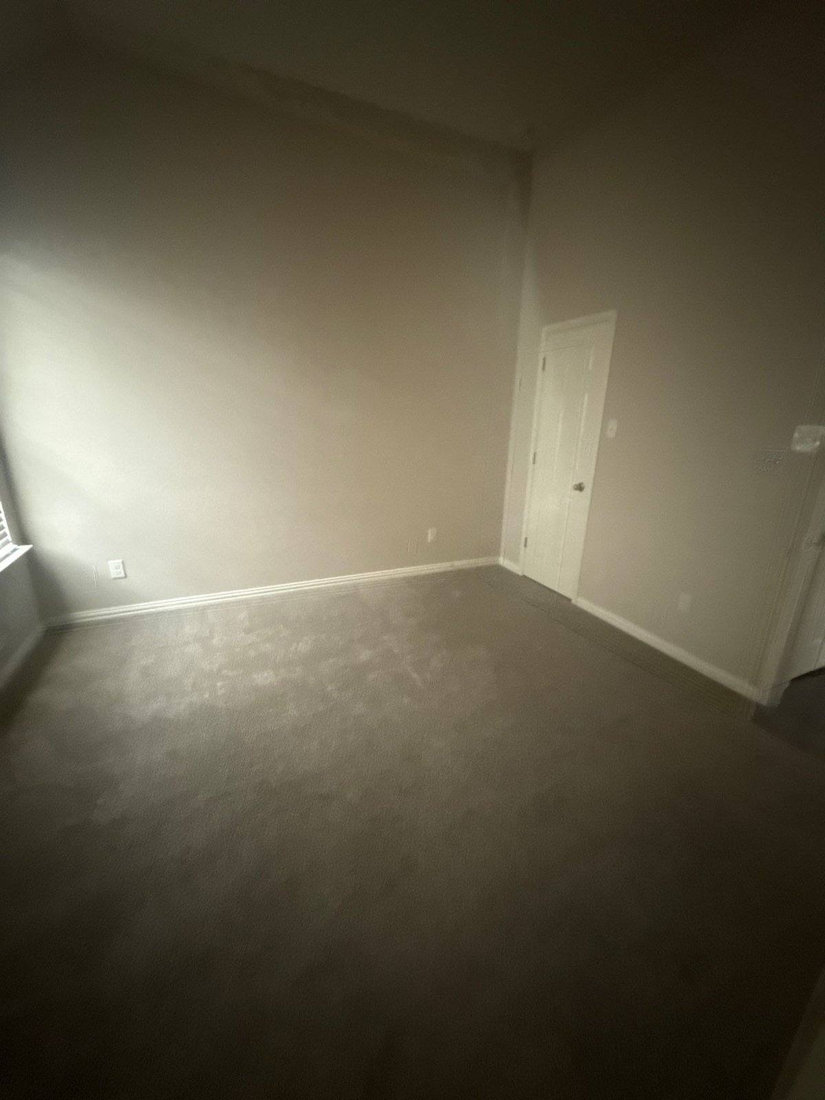 Middle bedroom before interior painting in Pflugerville, TX by Hill Country Painting