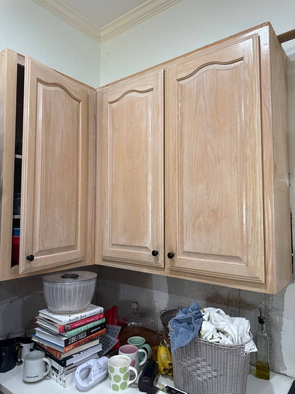 Kitchen cabinets before painting in Austin, TX by Hill Country Painting
