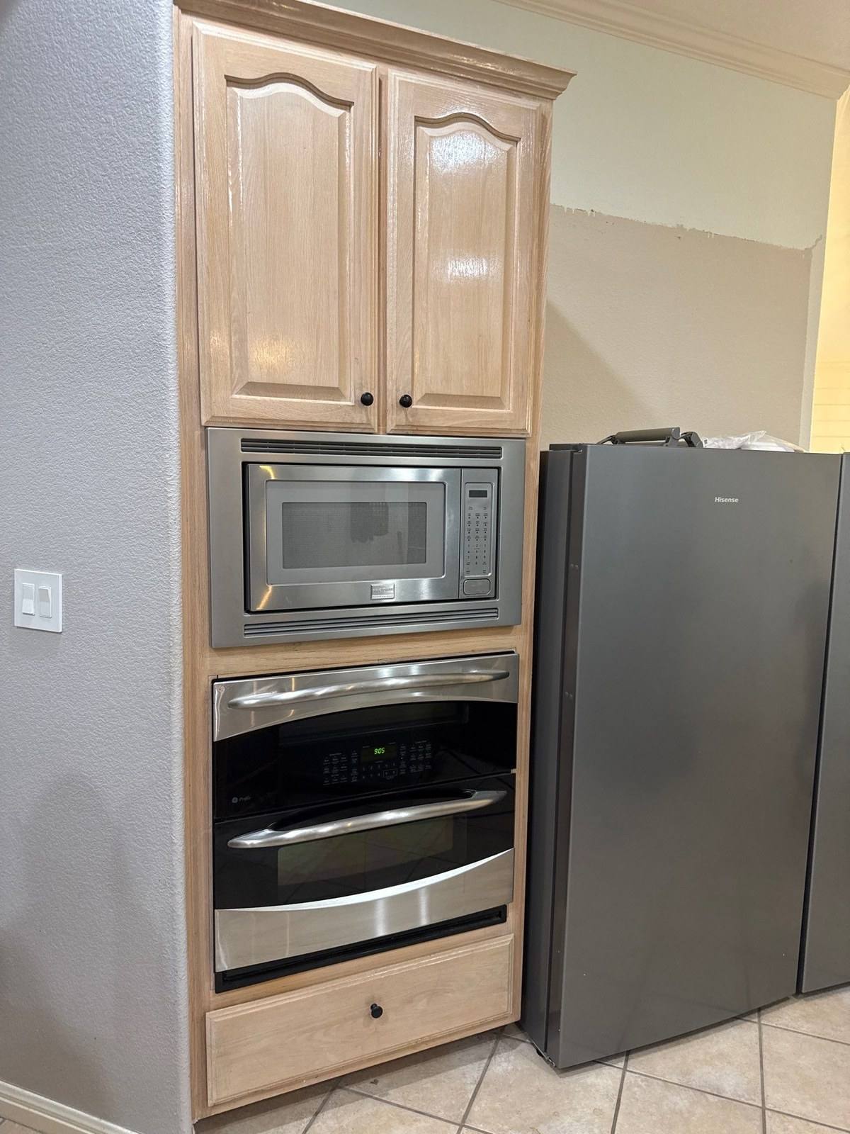 Kitchen cabinets and built-ins before painting in Austin, TX by Hill Country Painting