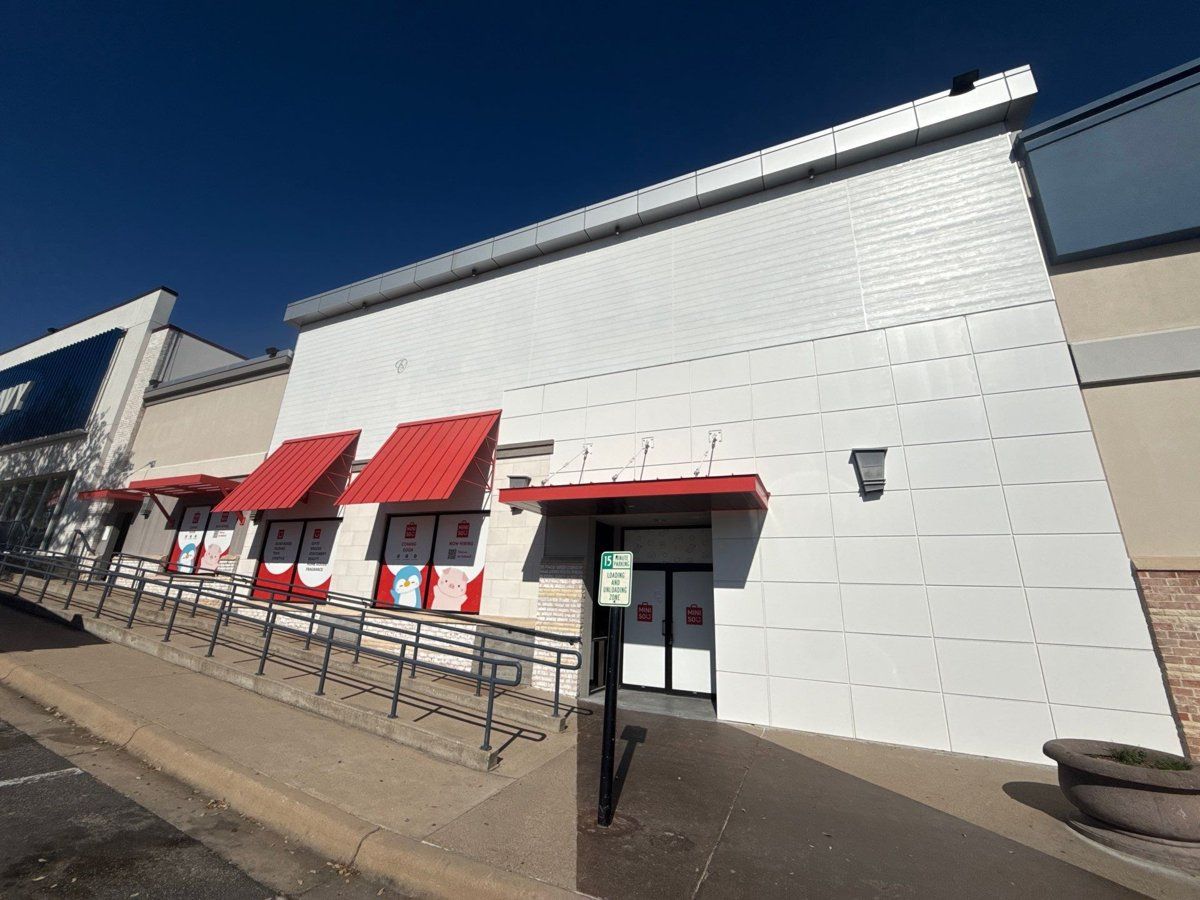 Retail storefront exterior before painting in Austin, TX by Hill Country Painting