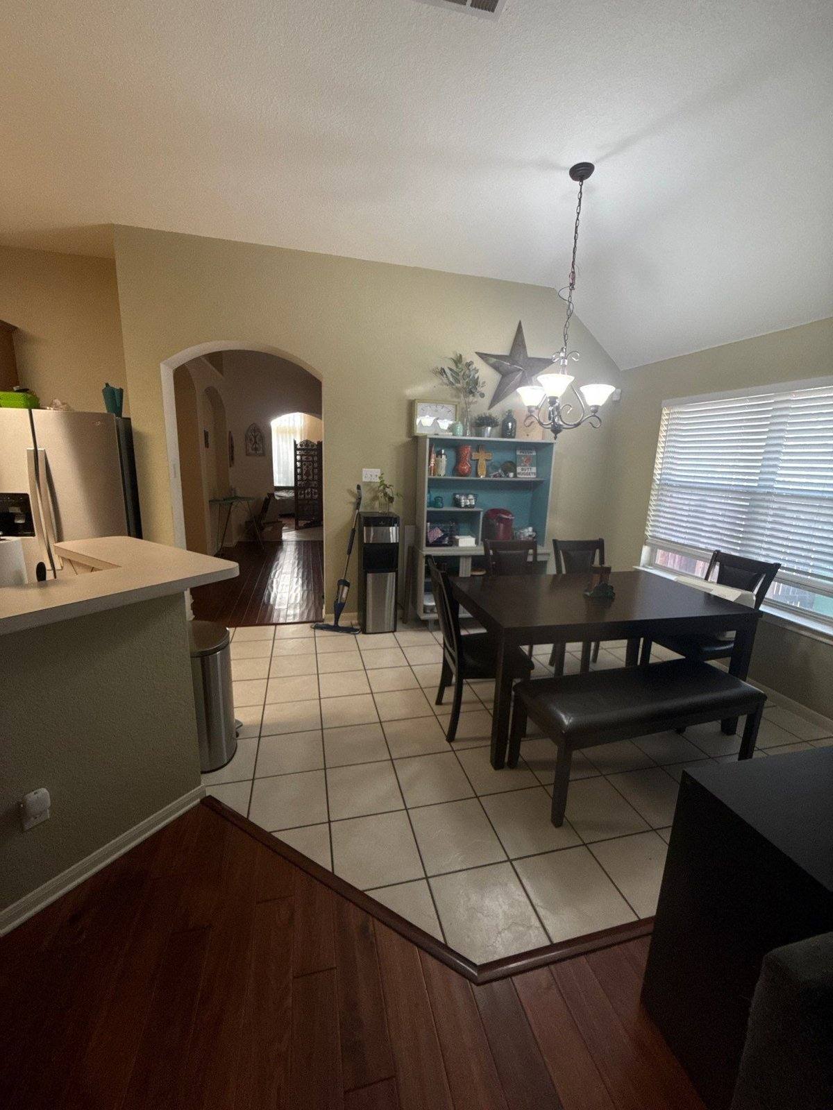Dining and kitchen area before painting in Round Rock, TX by Hill Country Painting