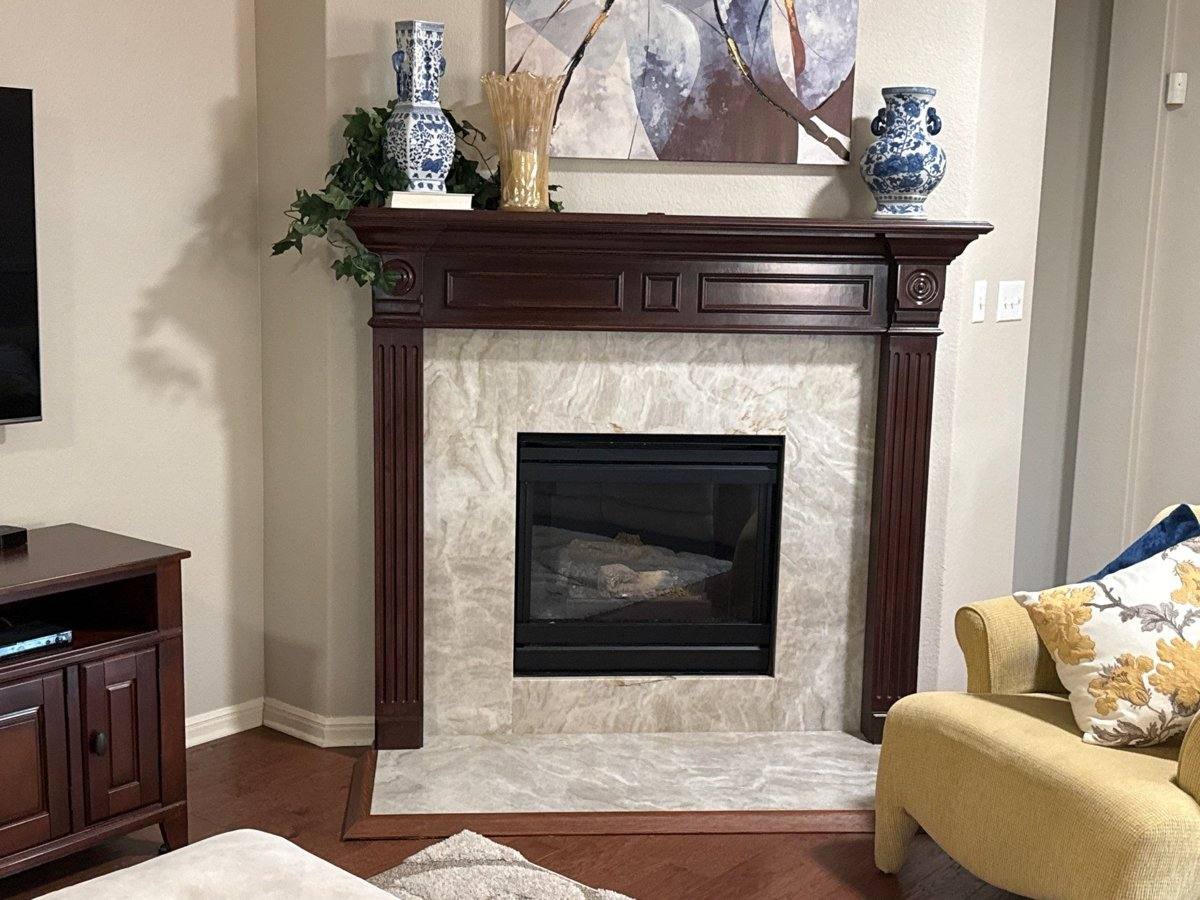Fireplace mantle before painting in Cedar Park, TX by Hill Country Painting