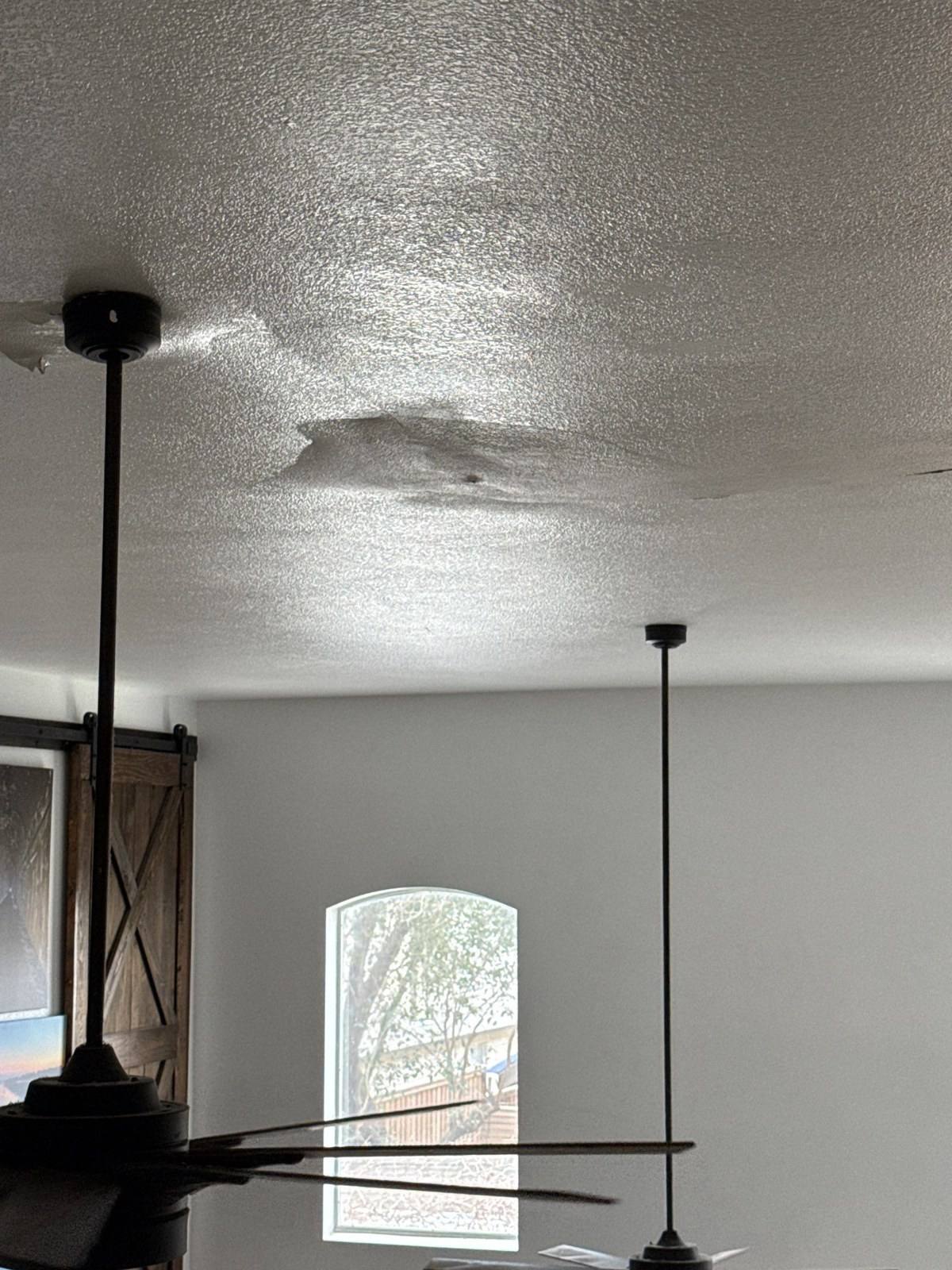 Living room ceiling before repair and painting in Round Rock, TX by Hill Country Painting