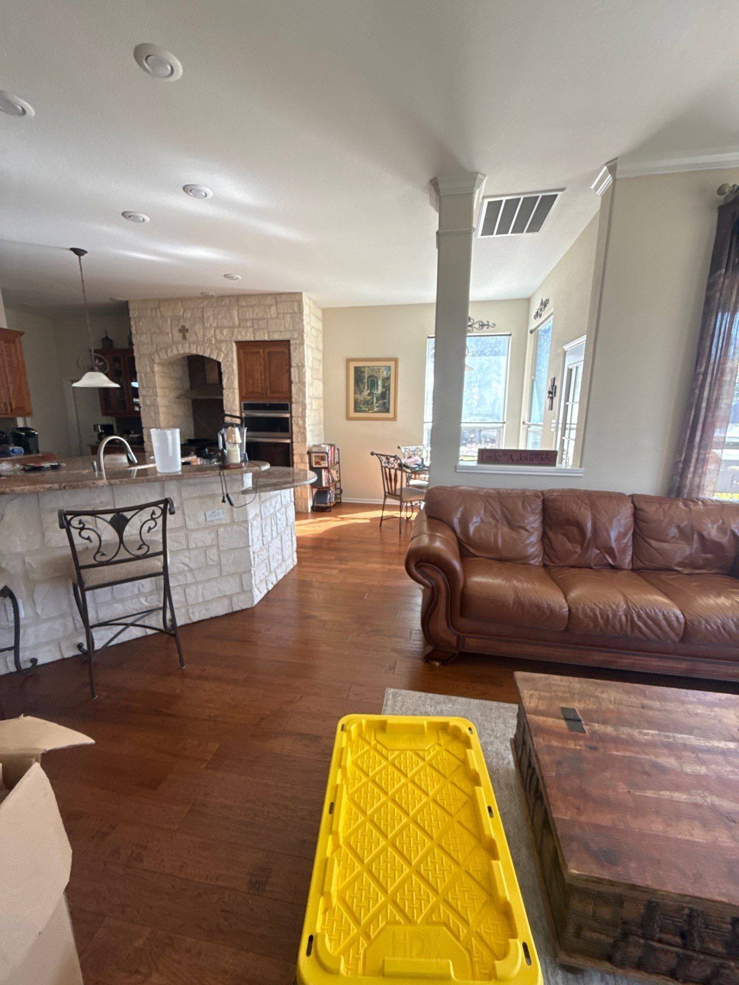 Living room and kitchen area ahead of interior painting in Georgetown, TX by Hill Country Painting