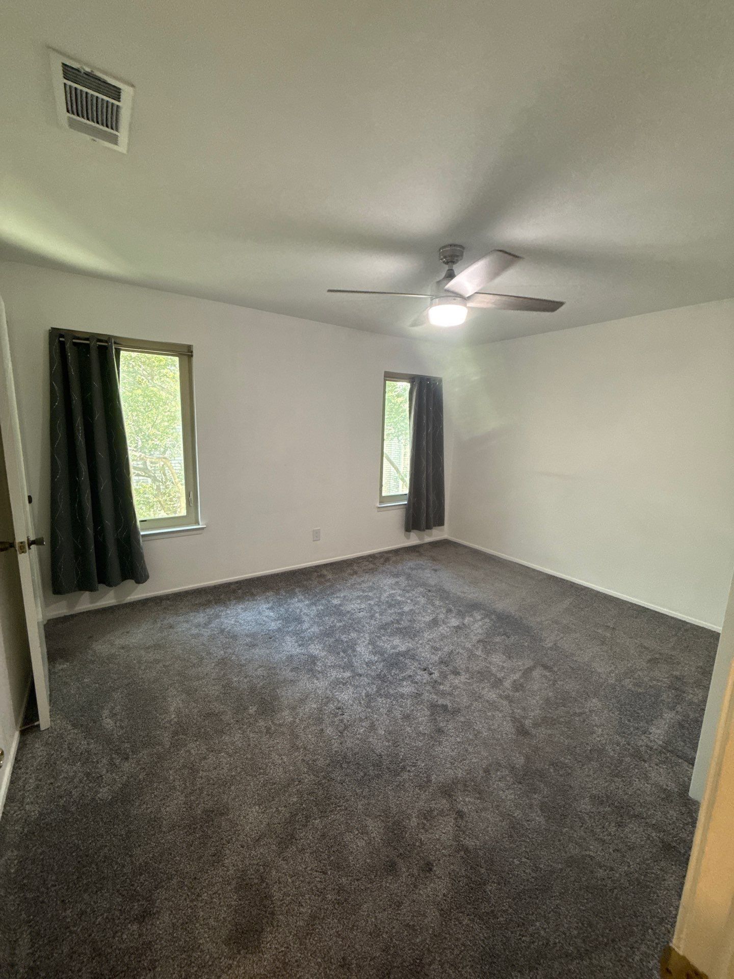 Bedroom ahead of interior painting in Austin, TX by Hill Country Painting