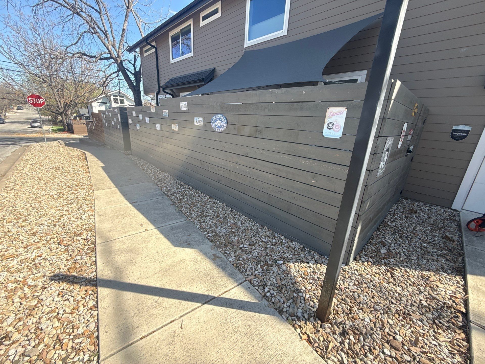 Fence ahead of staining in Austin, TX by Hill Country Painting