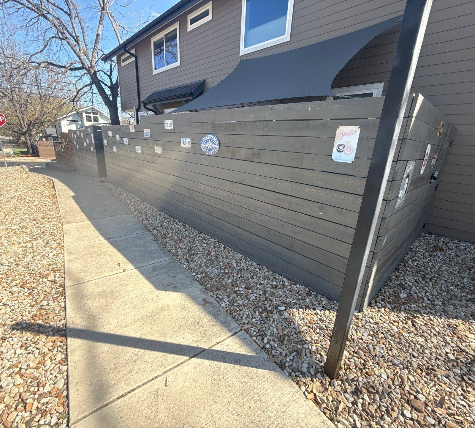 Fence ahead of staining in Austin, TX by Hill Country Painting
