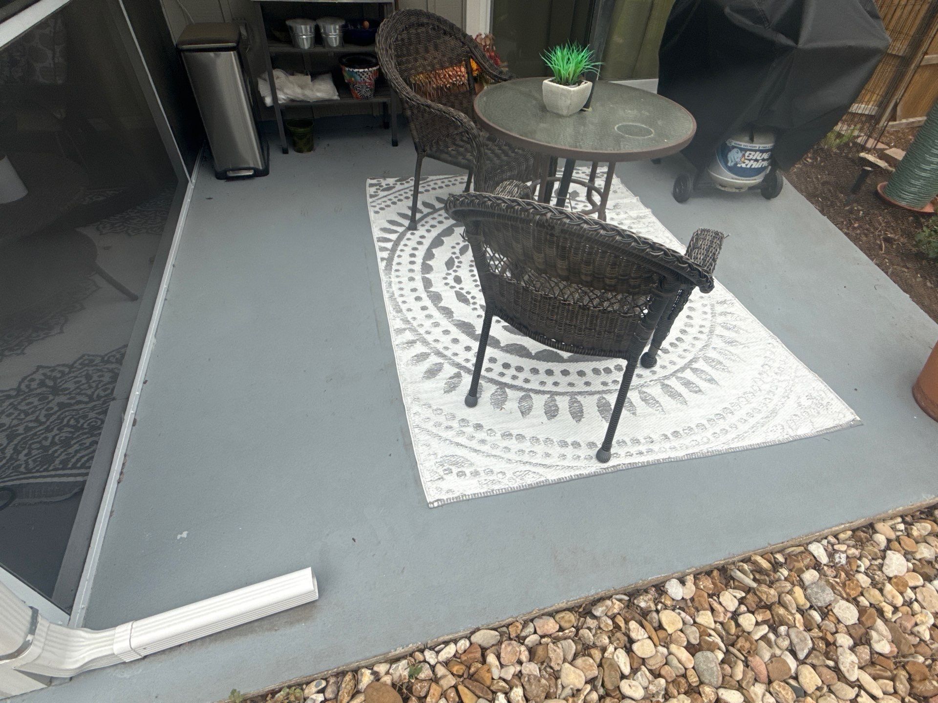Concrete patio ahead of painting in Austin, TX by Hill Country Painting