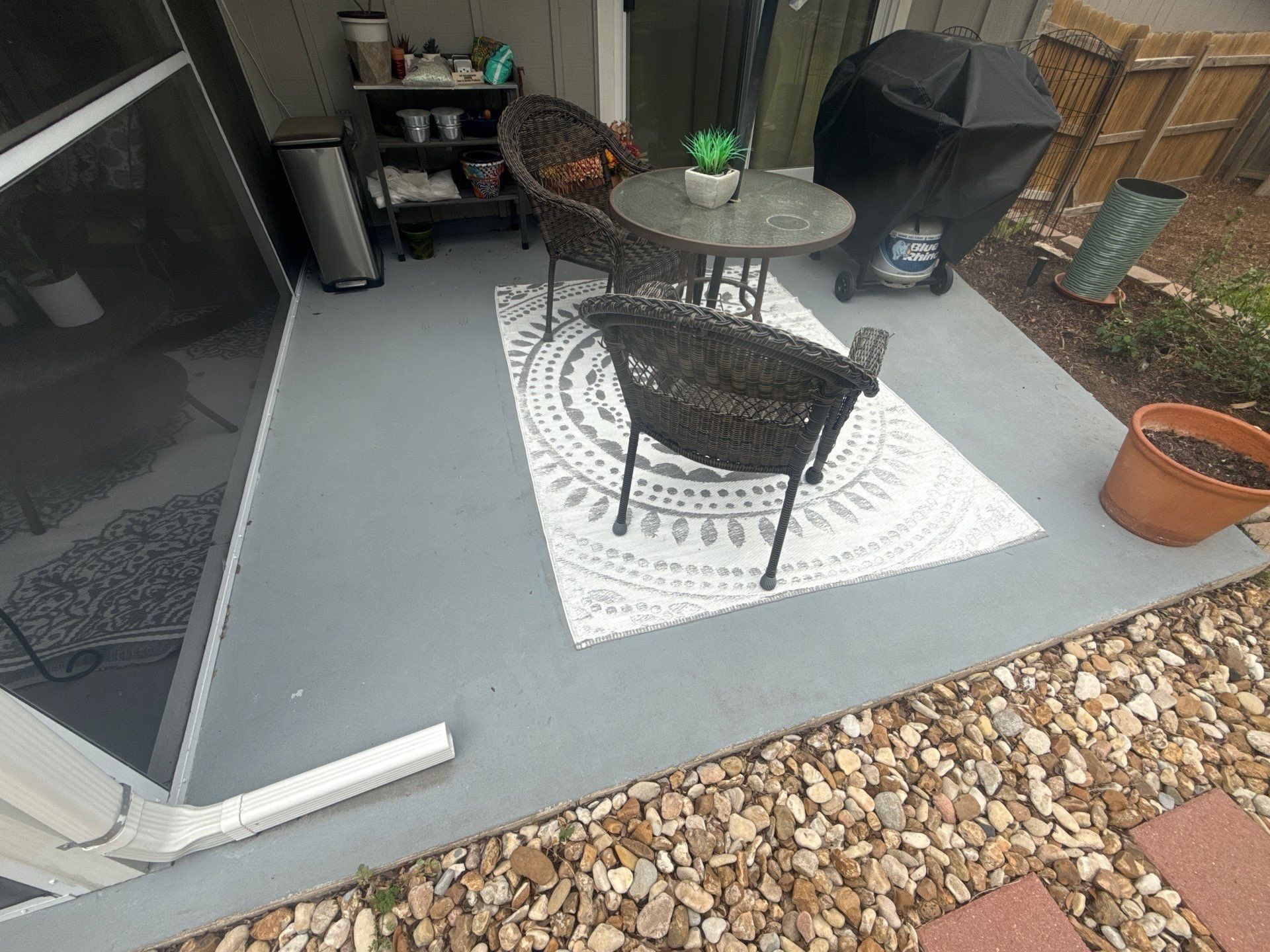 Concrete patio ahead of painting in Austin, TX by Hill Country Painting