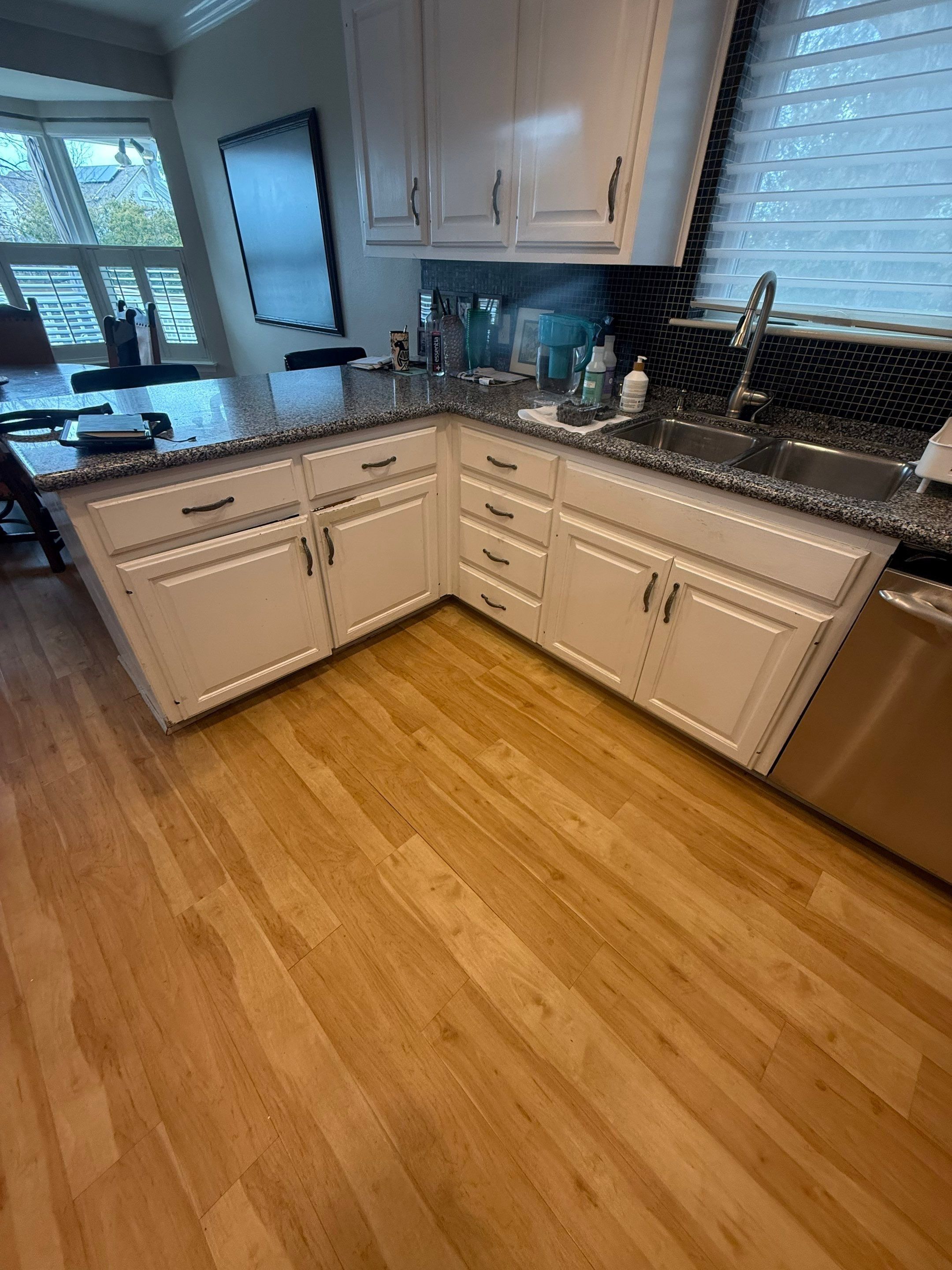Kitchen cabinets ahead of cabinet painting in Austin, TX by Hill Country Painting