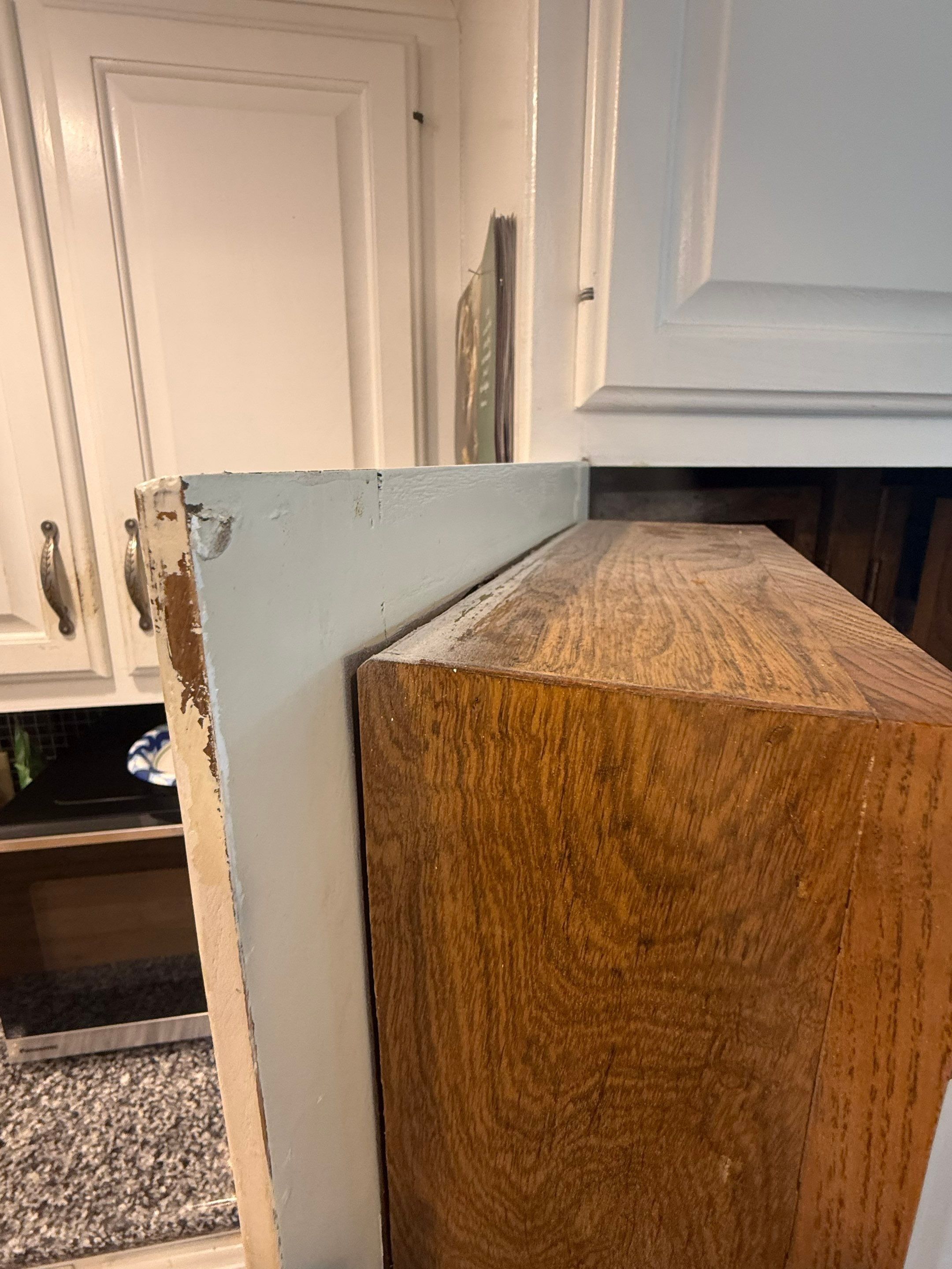 Worn cabinet finish ahead of cabinet painting in Austin, TX by Hill Country Painting